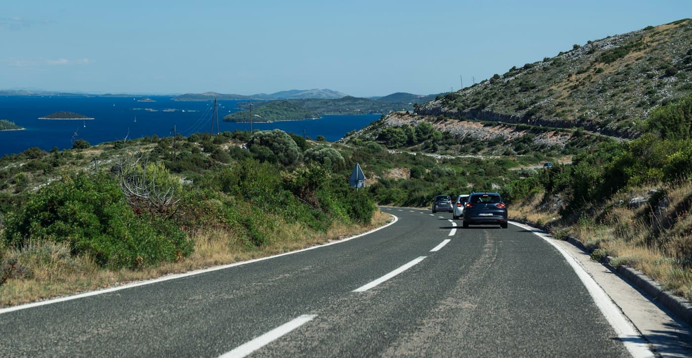 Cars on a coastal highway